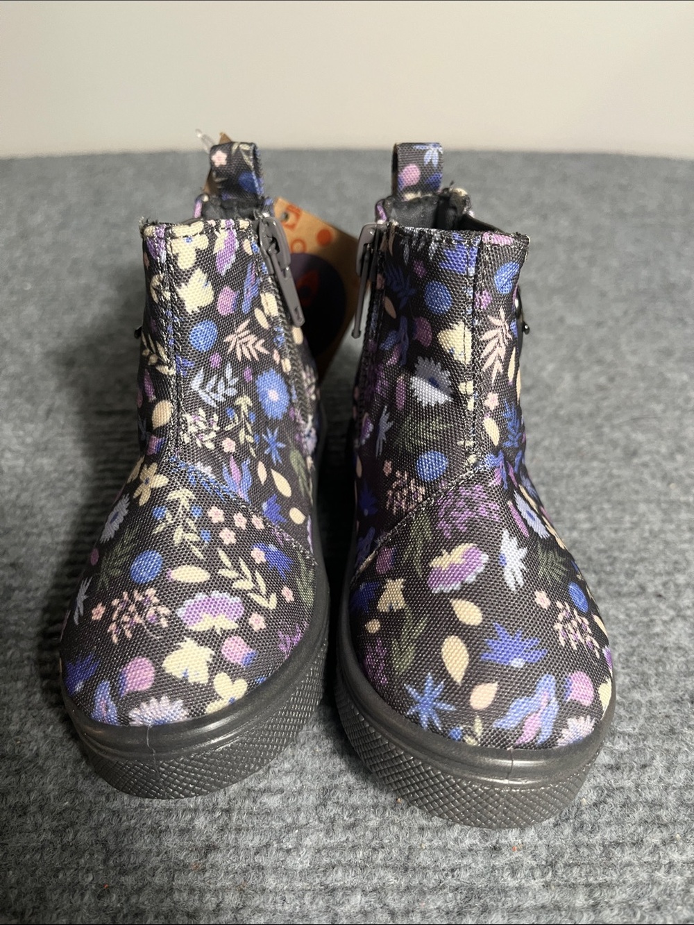 oomphies Black Floral Zip-Up Kids Ankle Boots with Purple and Blue Accents